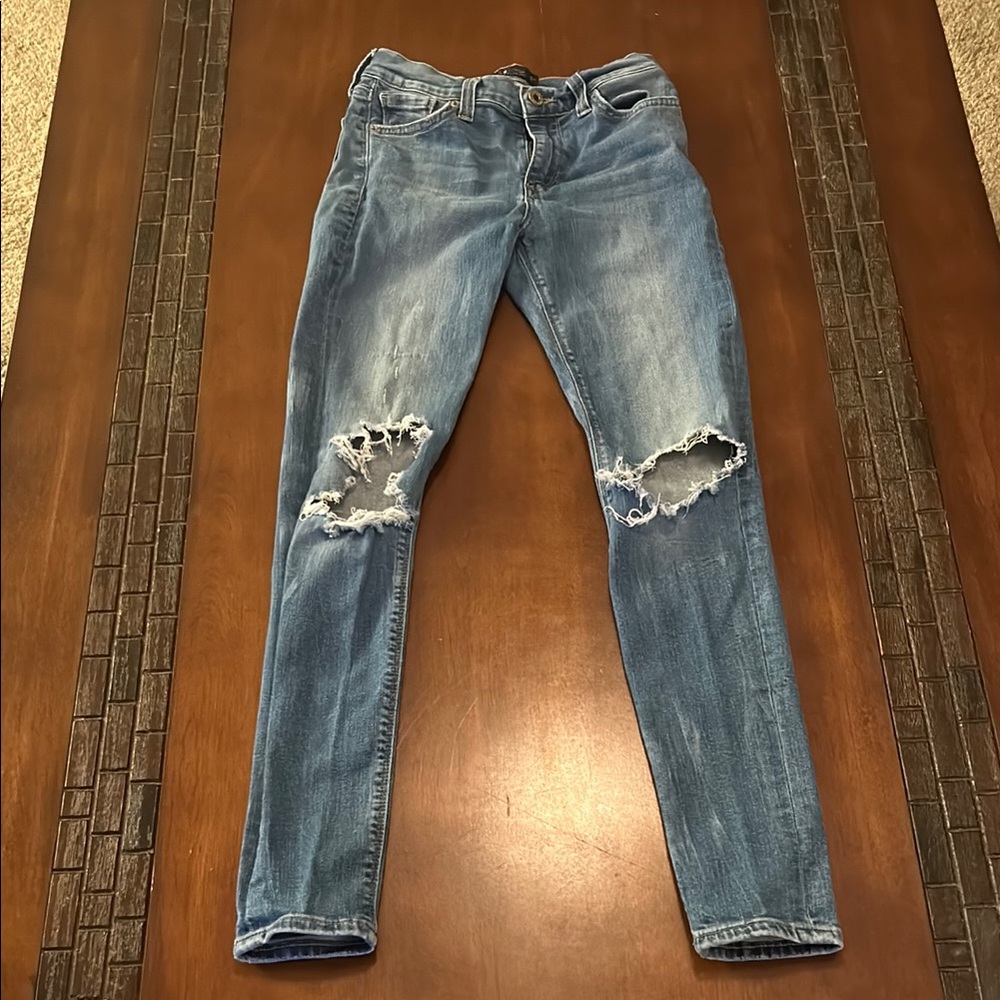 Distressed Blue Jeans
